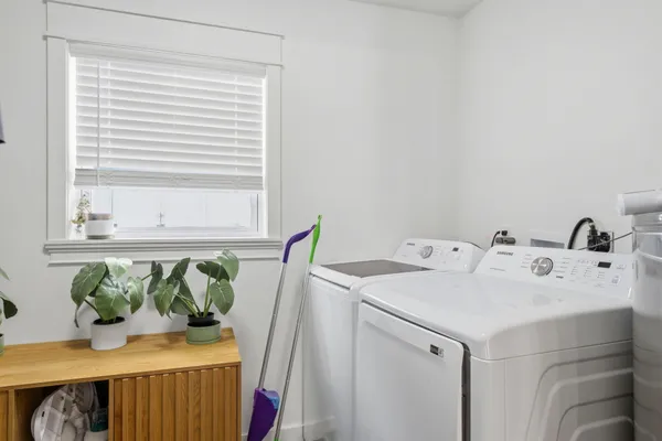 a utility room with dryer and washer