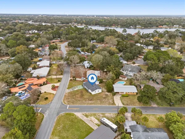an aerial view of residential house with outdoor space