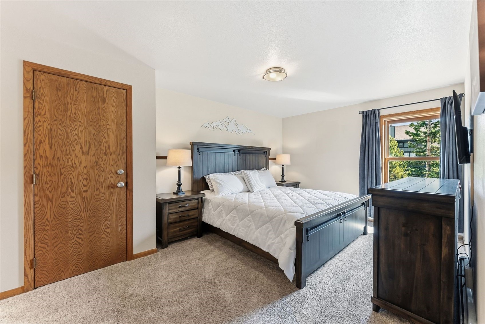 89100 Ryan Gulch Road, Unit 104 Silverthorne, CO 80498 - Photo 15 of 33 Main Bedroom