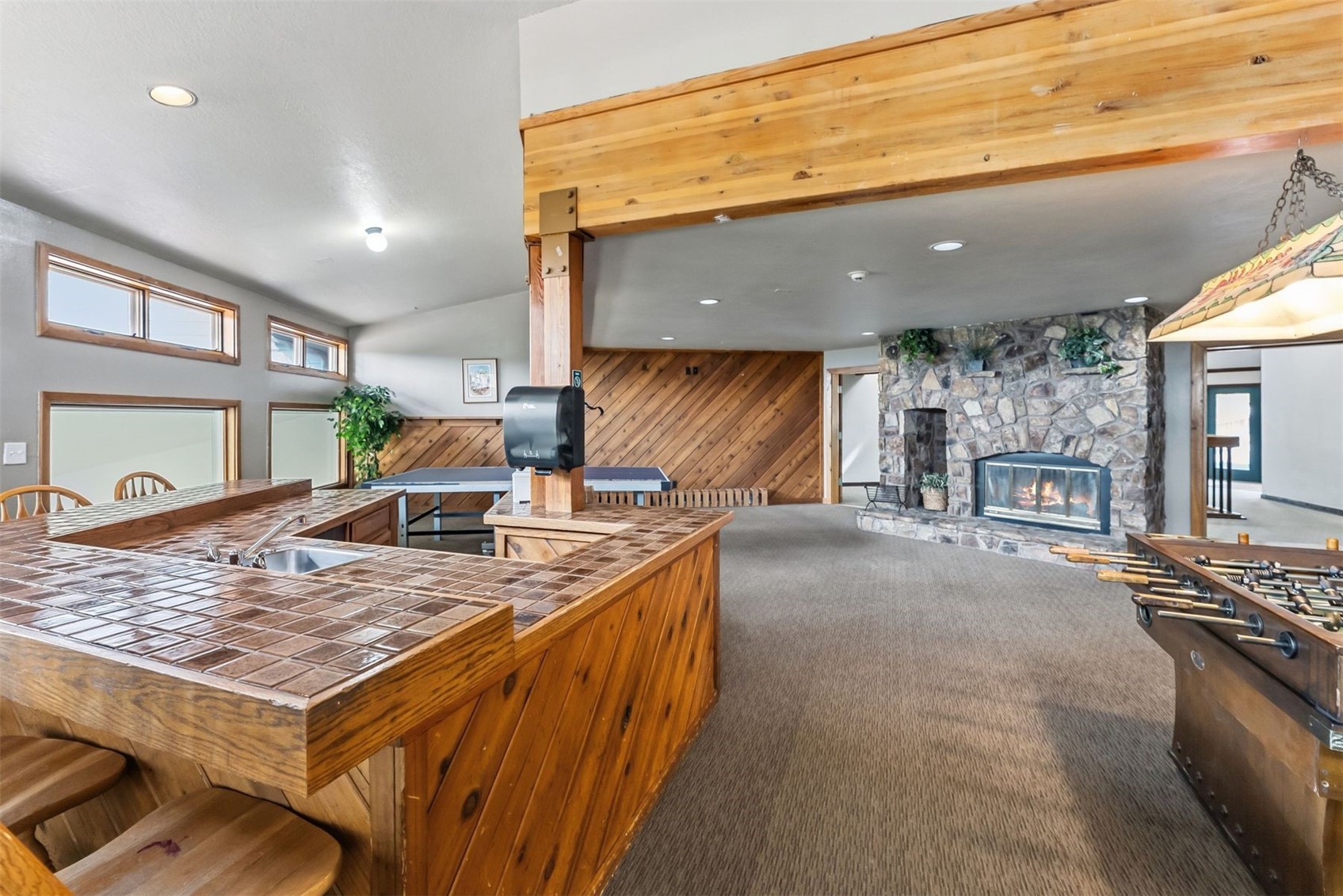 89100 Ryan Gulch Road, Unit 104 Silverthorne, CO 80498 - Photo 28 of 33 Common Lounge/Rec Room