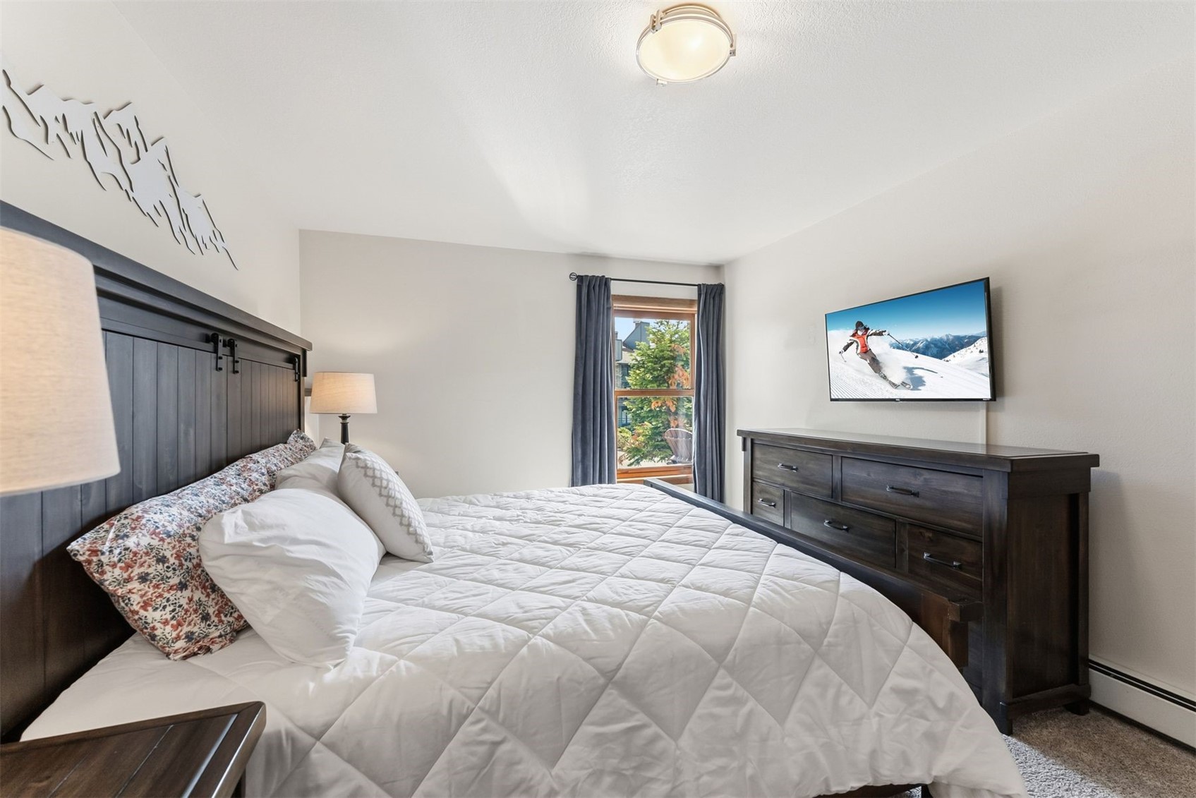 89100 Ryan Gulch Road, Unit 104 Silverthorne, CO 80498 - Photo 3 of 33 Main Bedroom