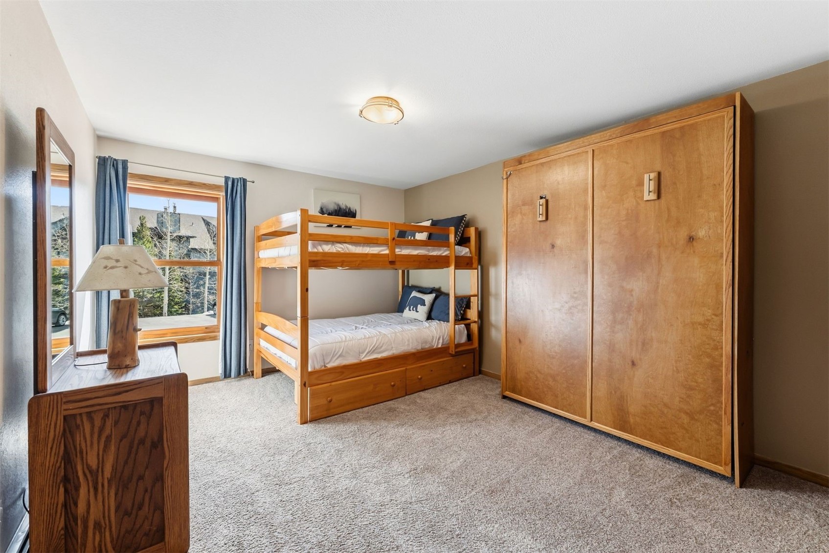 89100 Ryan Gulch Road, Unit 104 Silverthorne, CO 80498 - Photo 10 of 33 2nd Bedroom w/ Murphy Bed