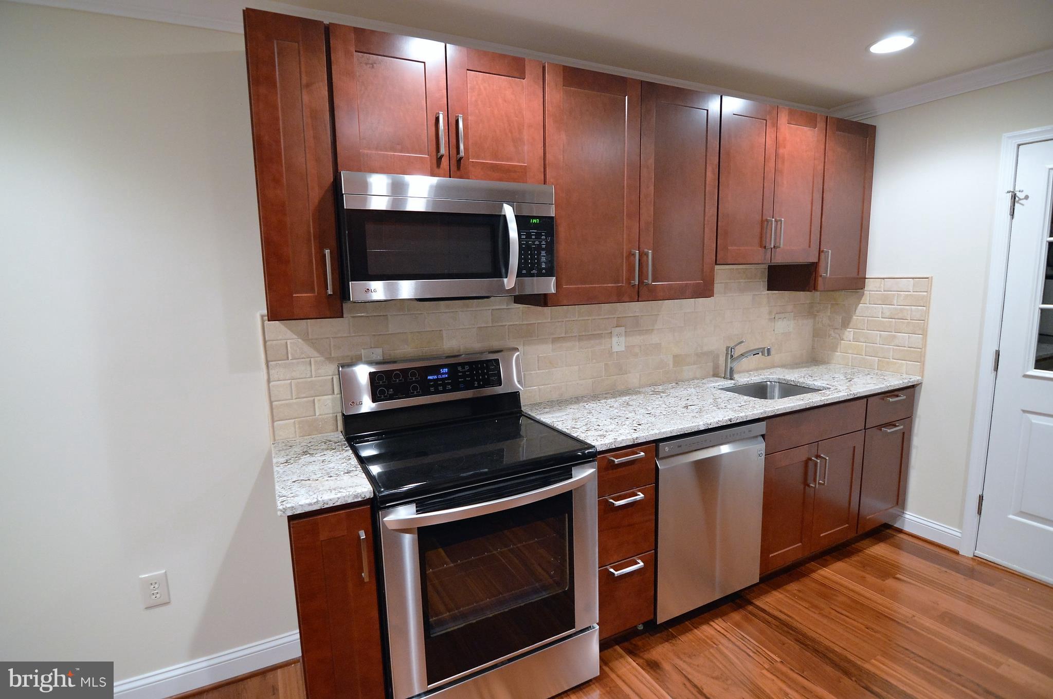 1035 Windrush Lane, Unit 9 Sandy Spring, MD 20860 - Photo 11 of 26 Kitchen with stainless steel appliances