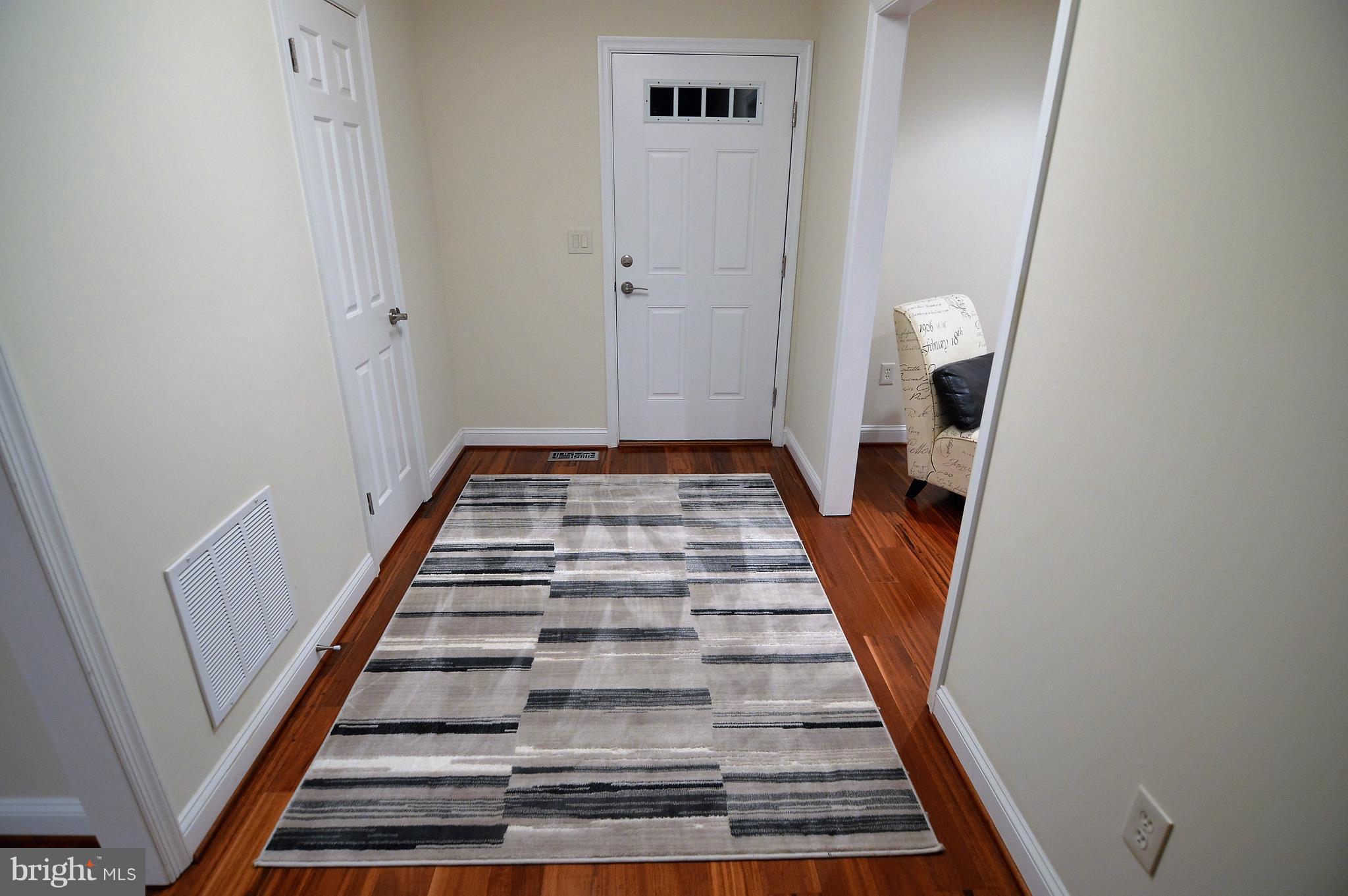 1035 Windrush Lane, Unit 9 Sandy Spring, MD 20860 - Photo 4 of 26 Huge open foyer with Tigerwood