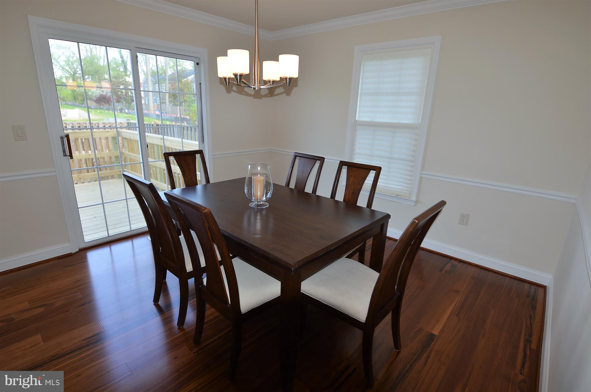 1035 Windrush Lane, Unit 9 Sandy Spring, MD 20860 - Photo 8 of 26 Dining room with Tigerwood flooring