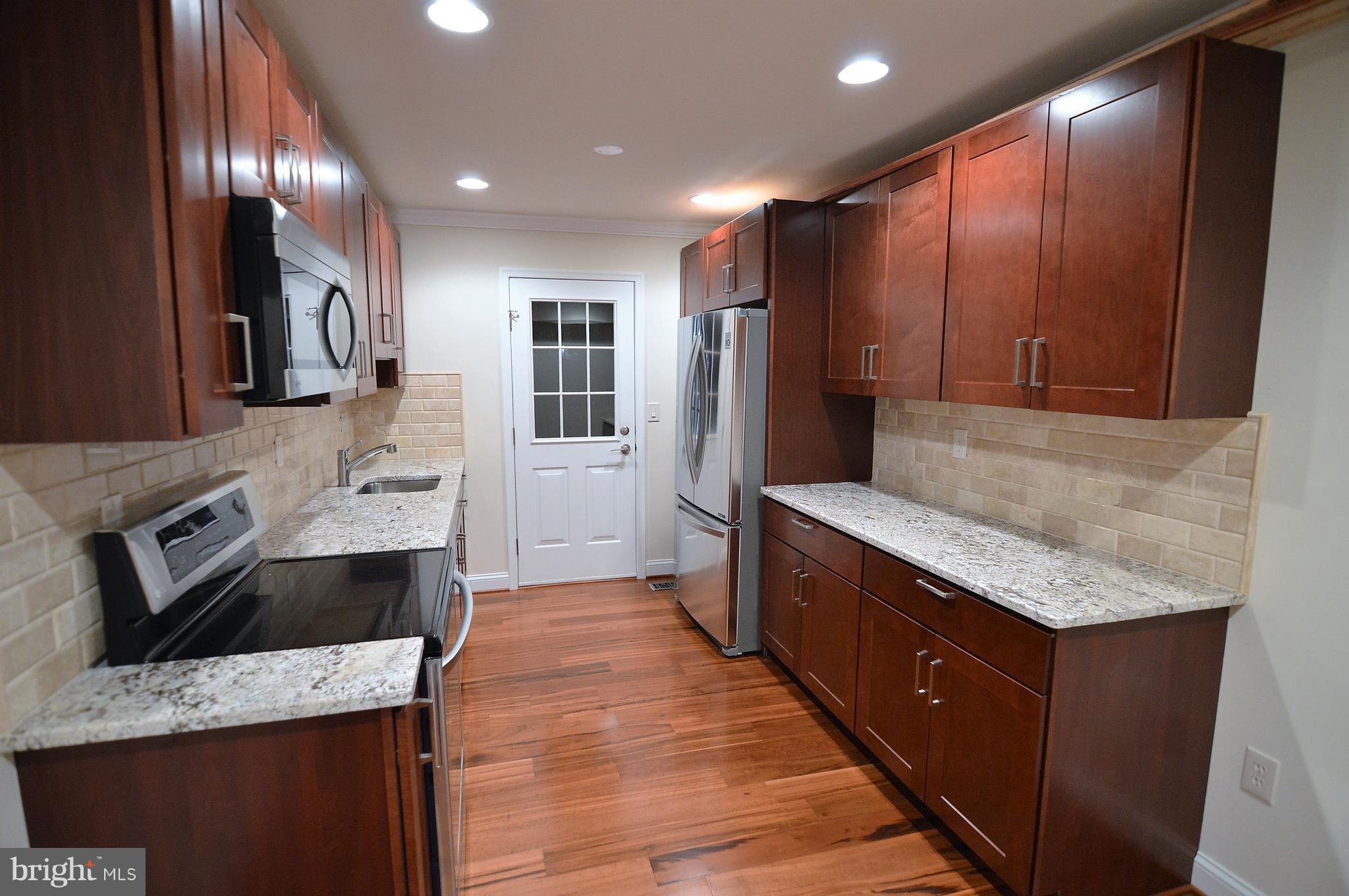 1035 Windrush Lane, Unit 9 Sandy Spring, MD 20860 - Photo 9 of 26 Kitchen with soft close cabinet doors/drawers