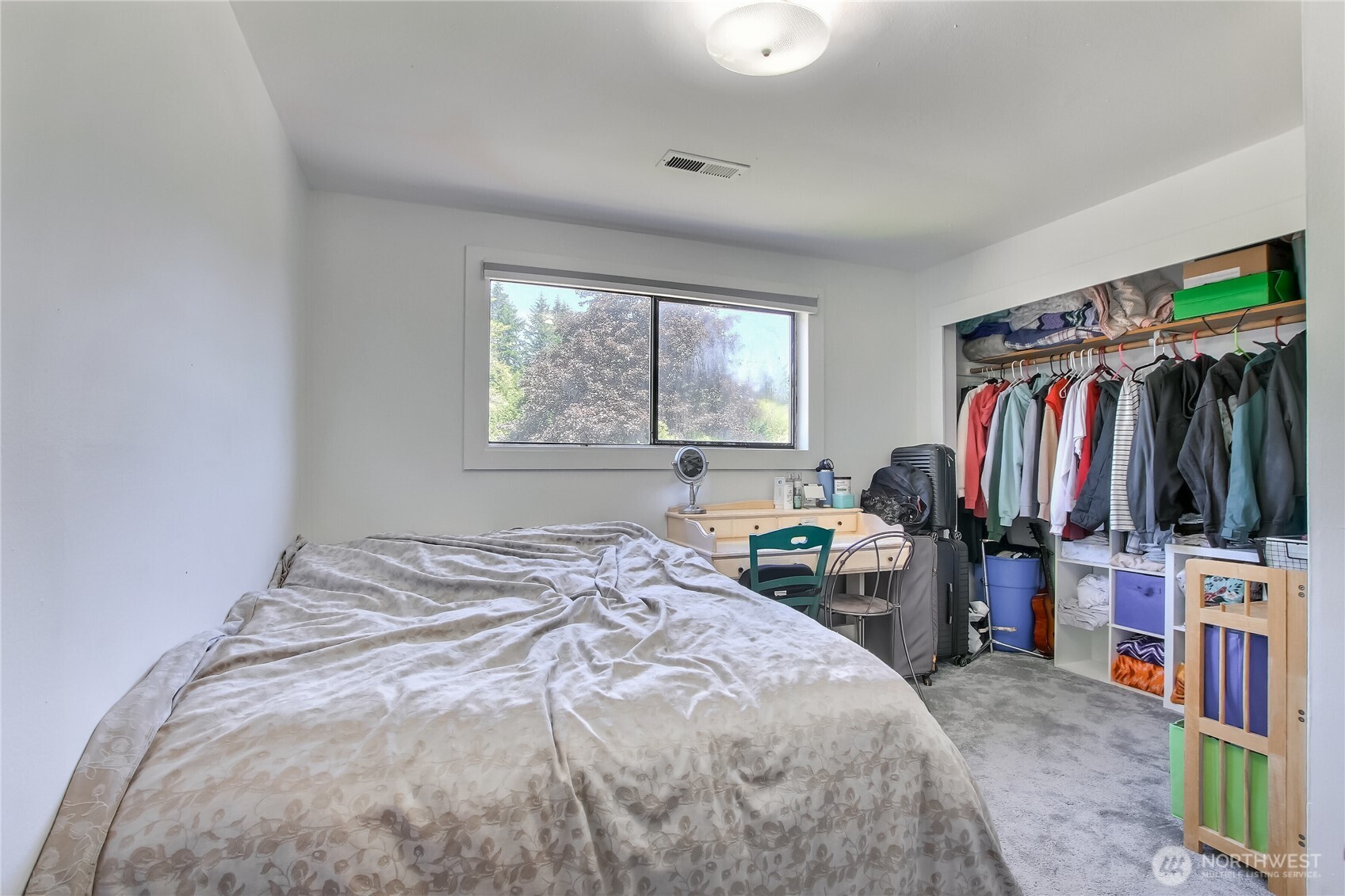 13610 Southeast 288th Street Kent, WA 98042 - Photo 12 of 32 a bedroom with a bed and a window