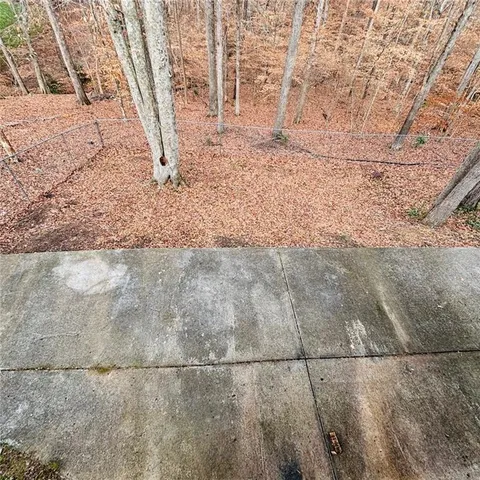 a view of a two chairs on the roof deck