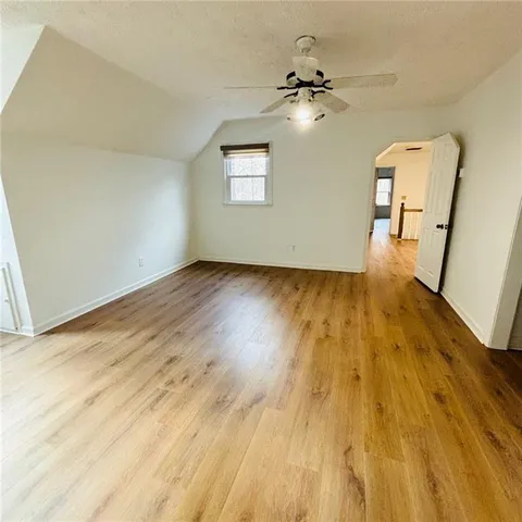 a bathroom with a double vanity sink and mirror