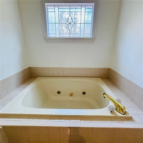 a view of an empty room with a large window