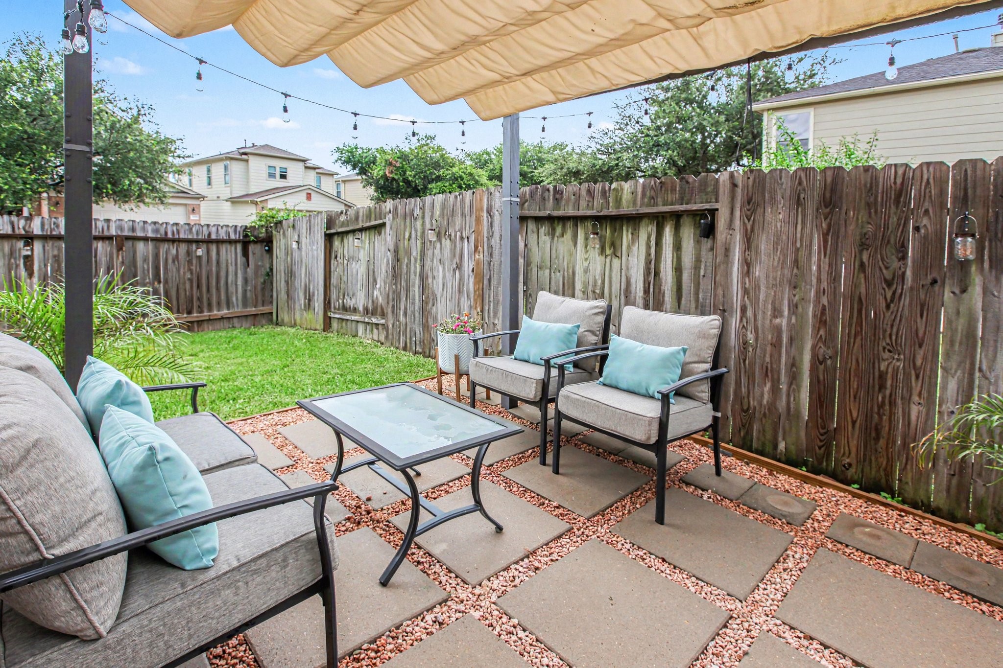 2903 Swift Brook Glen Way Spring, TX 77389 - Photo 25 of 30 Step outside to the backyard with a pergola and green space.