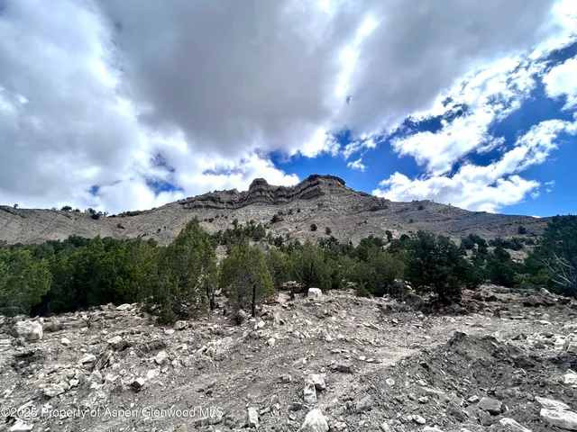 a view of a lake with a mountain in the background