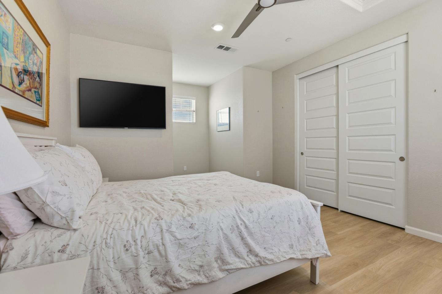 6385 Paysar Lane Gilroy, CA 95020 - Photo 14 of 27 a bedroom with a bed and a flat screen tv