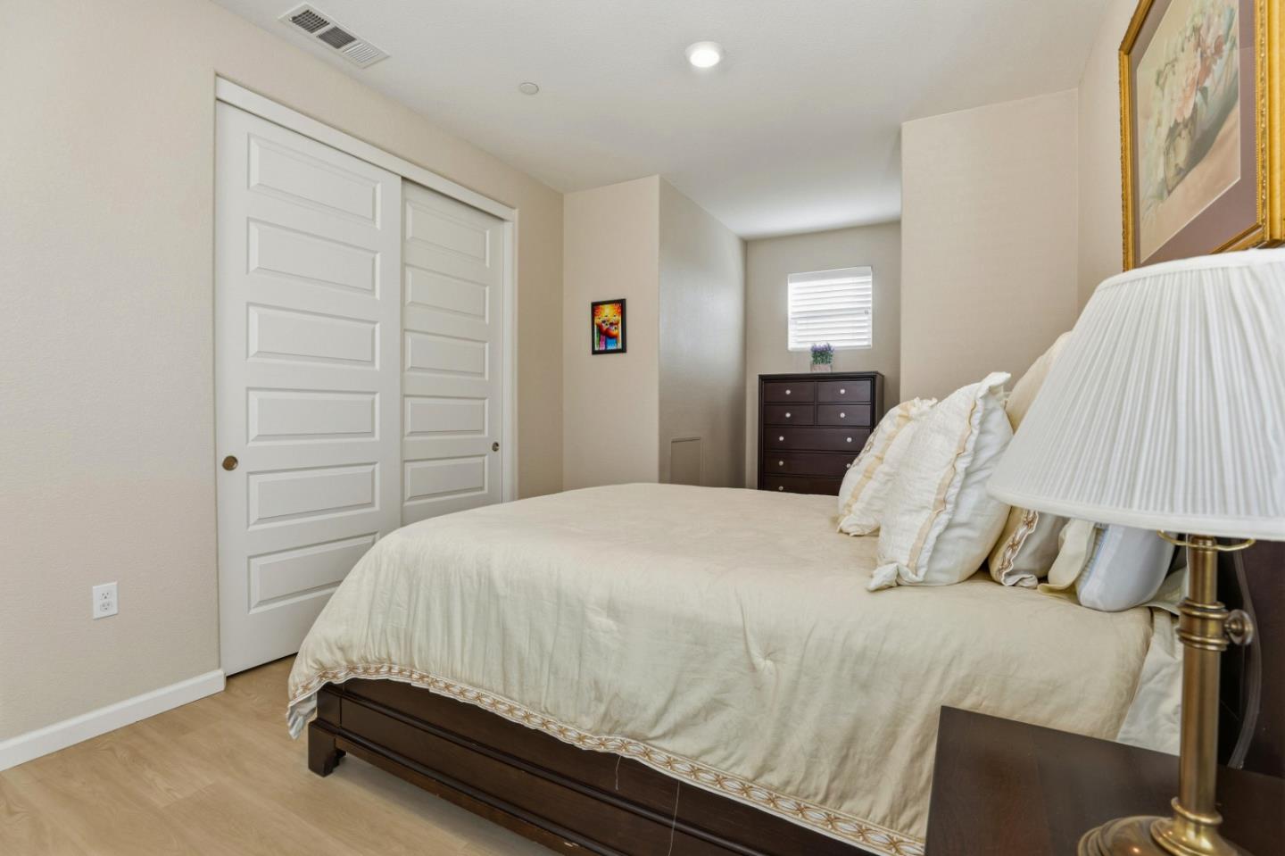 6385 Paysar Lane Gilroy, CA 95020 - Photo 16 of 27 a bedroom with a bed and a window
