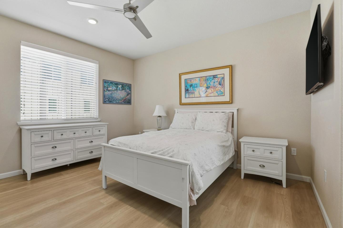 6385 Paysar Lane Gilroy, CA 95020 - Photo 20 of 27 a bedroom with a bed and a flat tv screen on the dresser