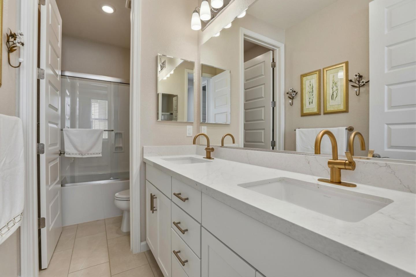 6385 Paysar Lane Gilroy, CA 95020 - Photo 22 of 27 a bathroom with a granite countertop sink mirror and double