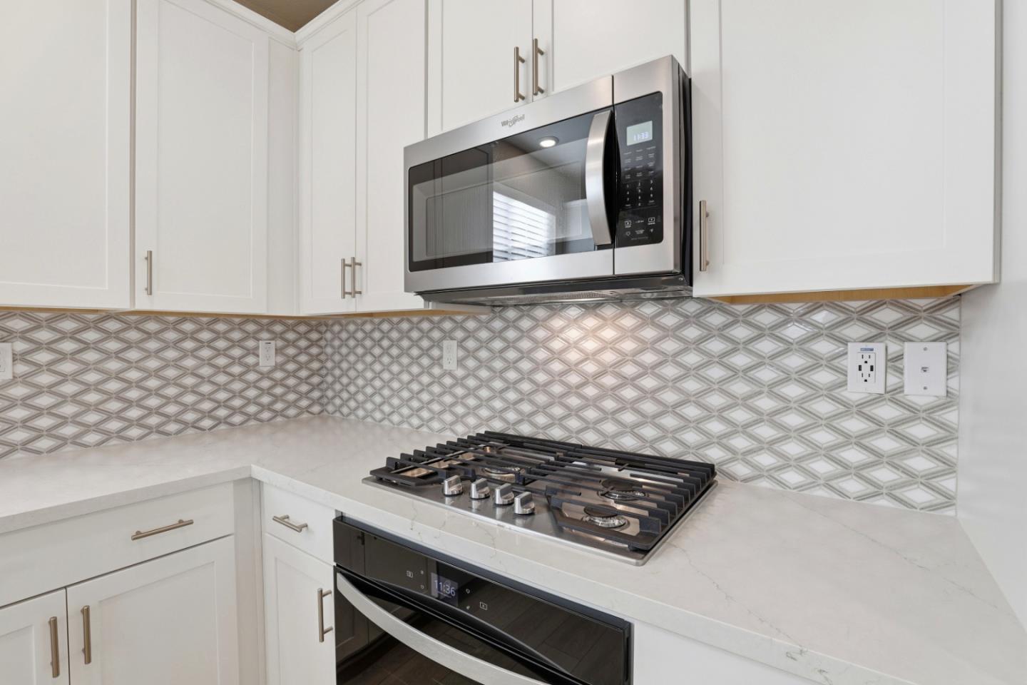 6385 Paysar Lane Gilroy, CA 95020 - Photo 6 of 27 a white stove top oven sitting inside of a kitchen
