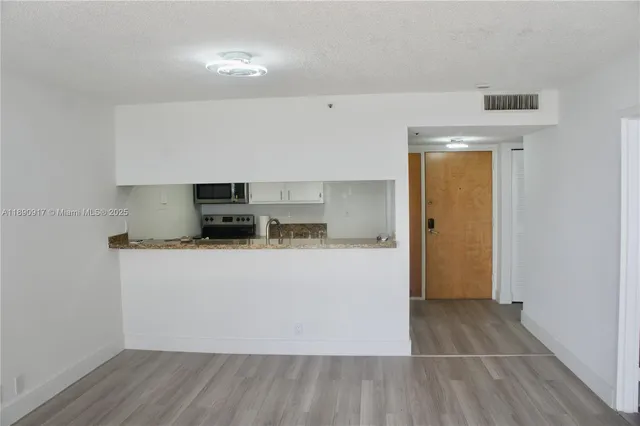 $455,000 | 7601 East Treasure Drive, Unit 1406, North Bay Village, FL 33141