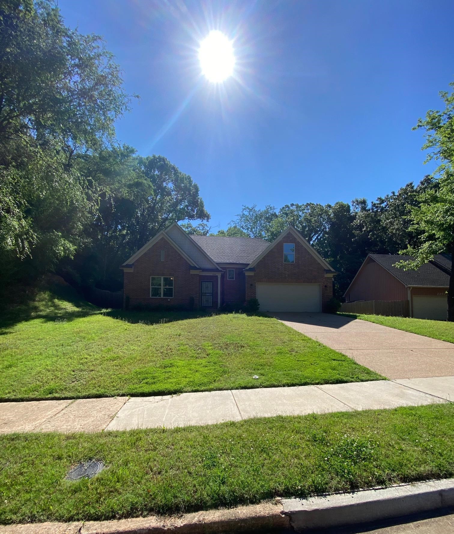 2260 Webbing Drive Memphis, TN 38016 - Photo 1 of 17 a view of outdoor space and yard