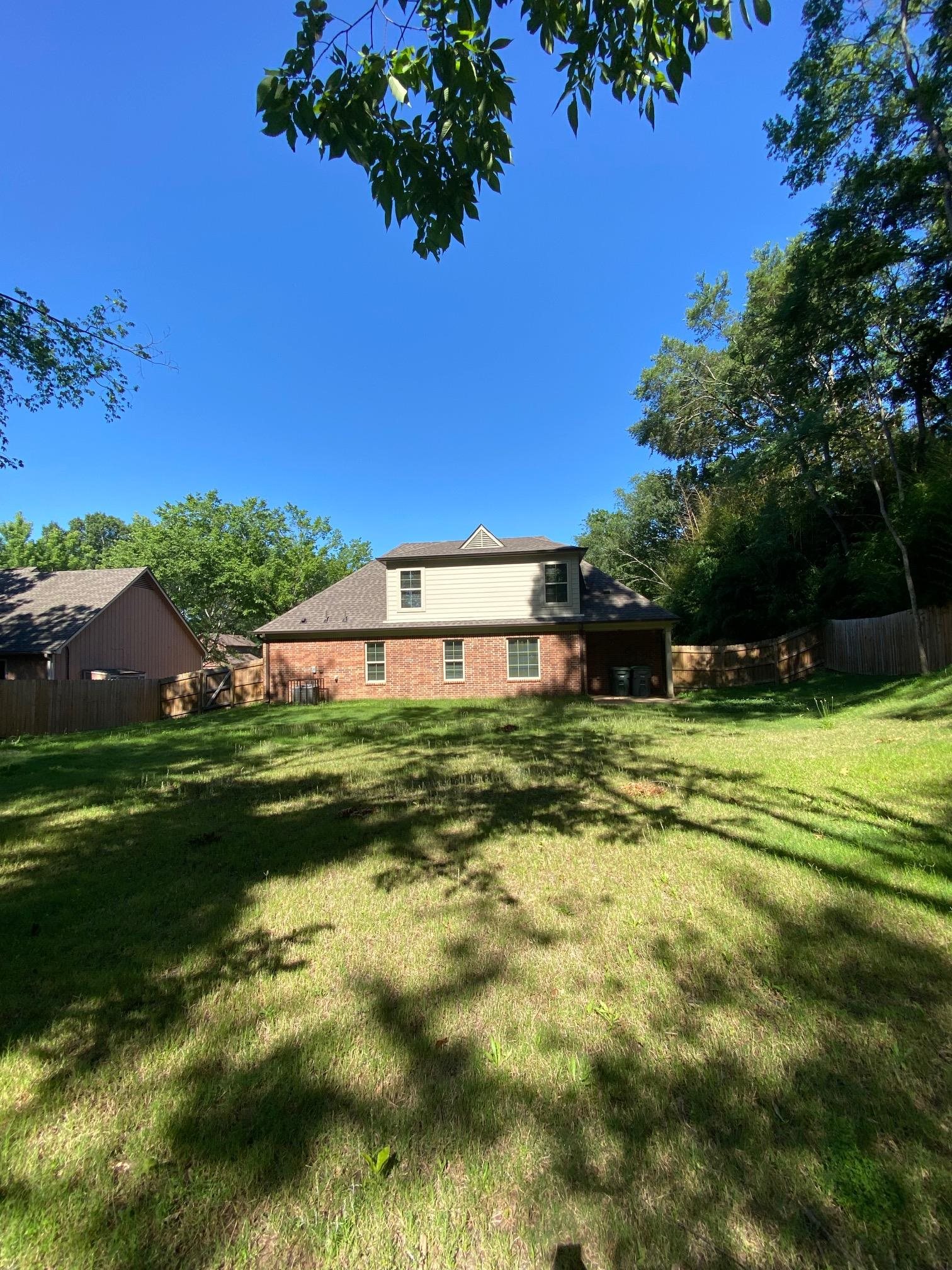 2260 Webbing Drive Memphis, TN 38016 - Photo 17 of 17 a view of a house with a yard