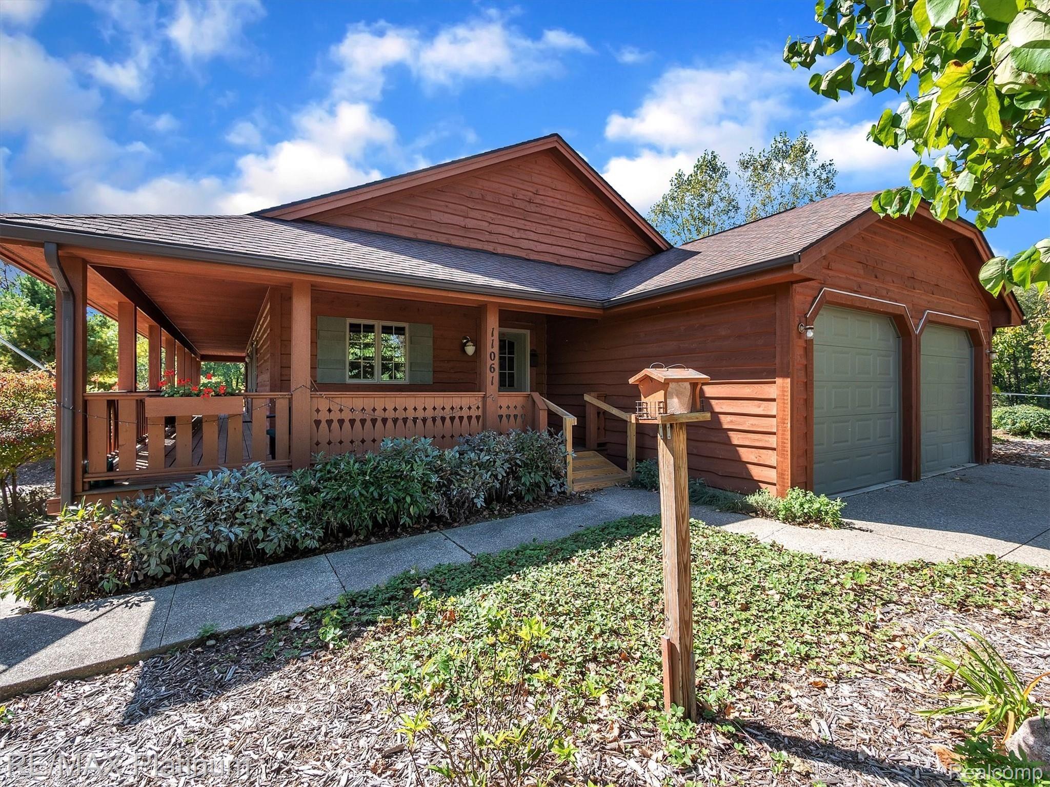 11061 Wiggins Road Howell, MI 48855 - Photo 3 of 79 CUSTOM BUILT CEDAR HOME!