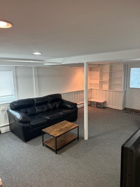 40 Brookline Avenue Hull, MA 02045 - Photo 17 of 24 a living room with furniture and a gate