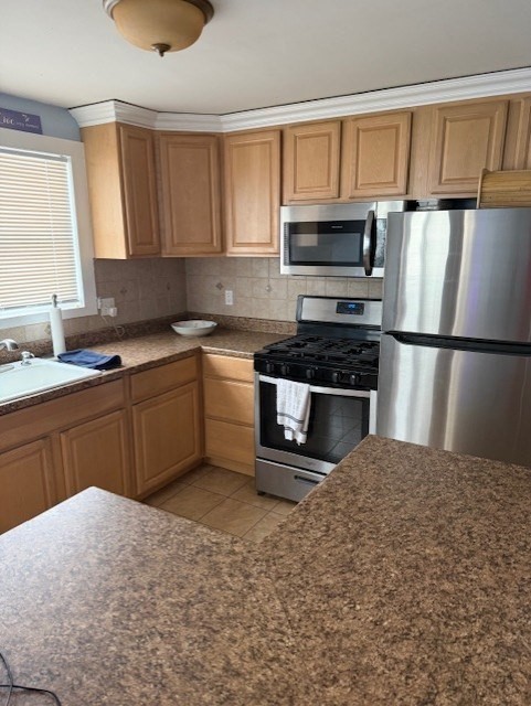 40 Brookline Avenue Hull, MA 02045 - Photo 6 of 24 a kitchen with a sink appliances and cabinets