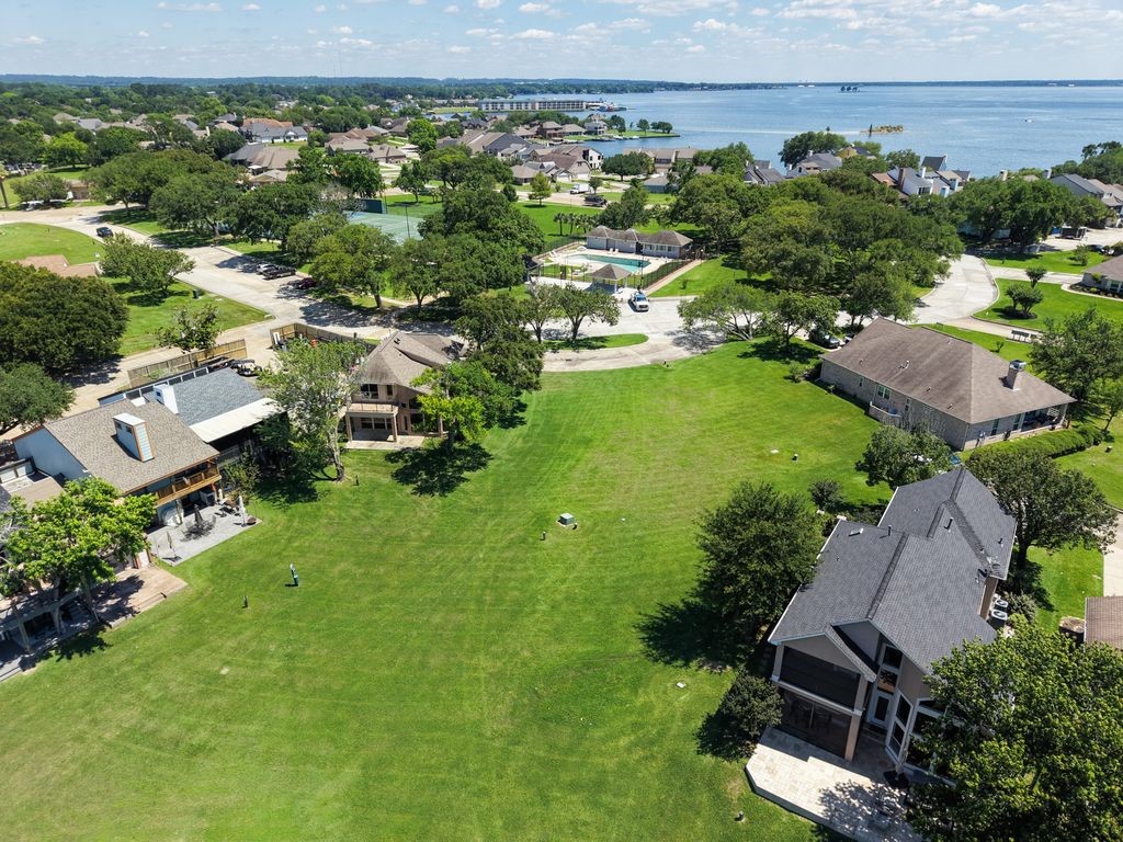 1607 Schooner Point Willis, TX 77318 - Photo 36 of 47 Aerial view from back of home, to the other side of Harbour Town Club. Note how large the greenspace is!!