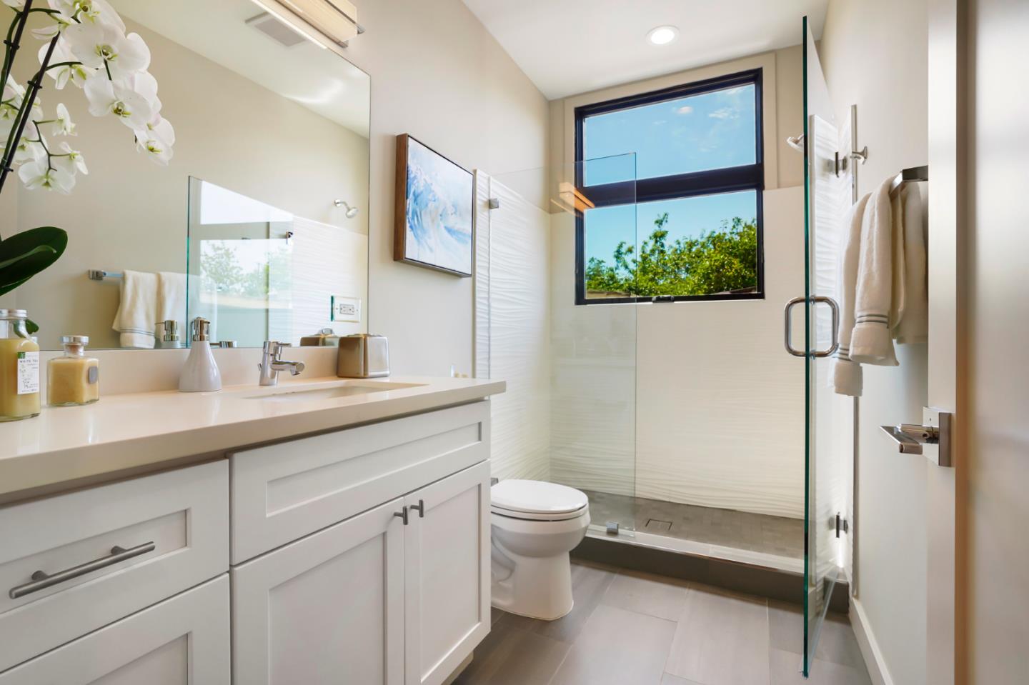 737 Ruby Street Redwood City, CA 94061 - Photo 12 of 26 a bathroom with a double vanity sink toilet and shower