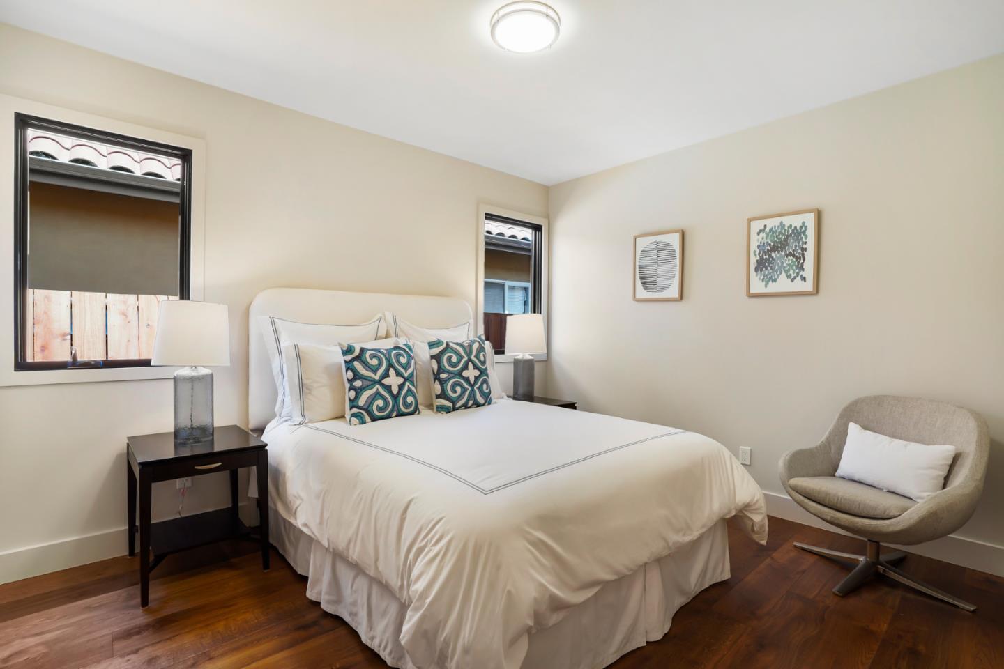 737 Ruby Street Redwood City, CA 94061 - Photo 16 of 26 a bedroom with a bed and chair