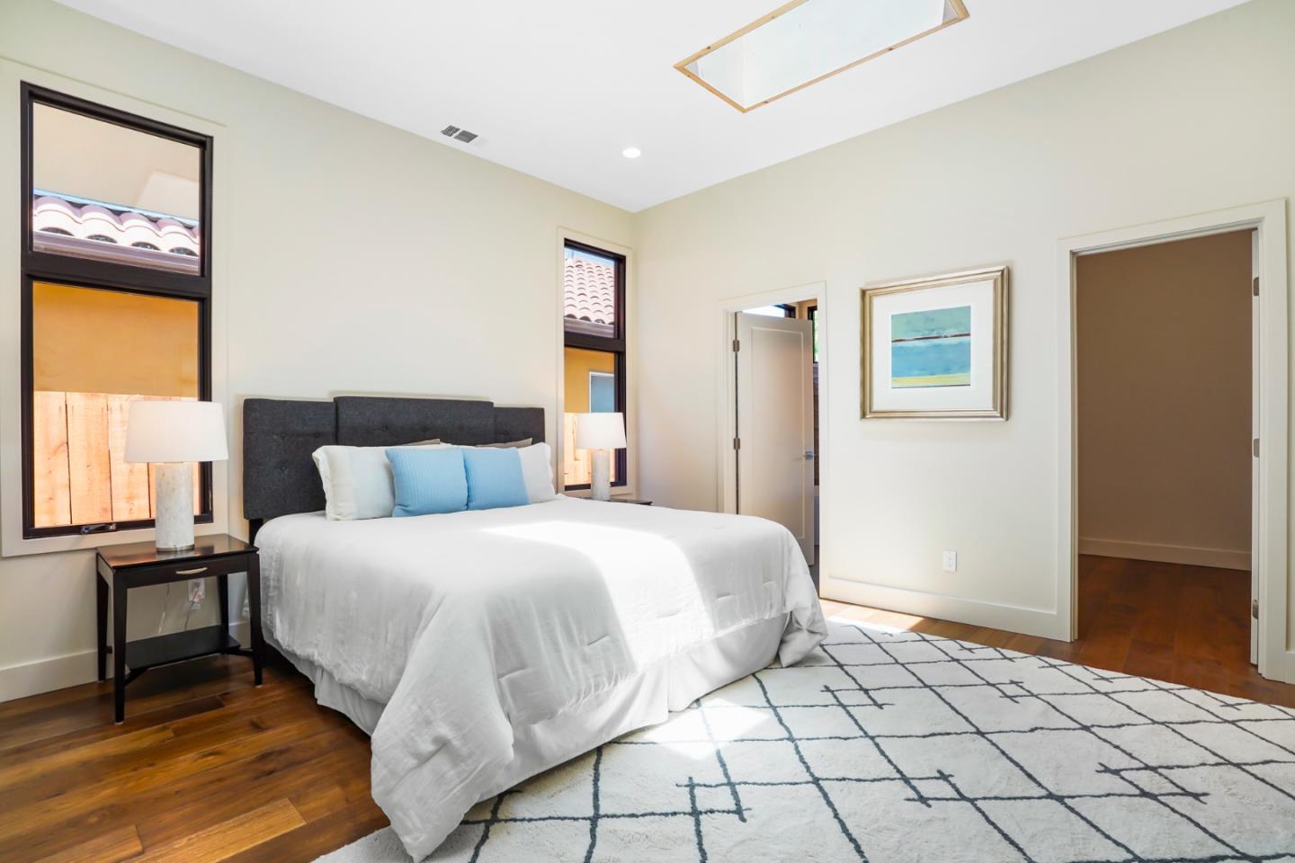 737 Ruby Street Redwood City, CA 94061 - Photo 19 of 26 a bedroom with a bed and a window