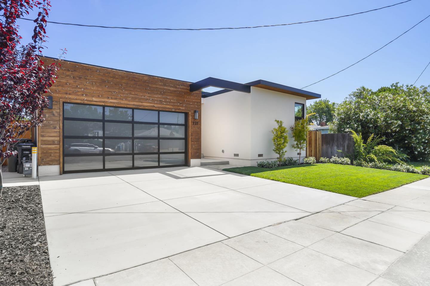 737 Ruby Street Redwood City, CA 94061 - Photo 2 of 26 a house view with a backyard space