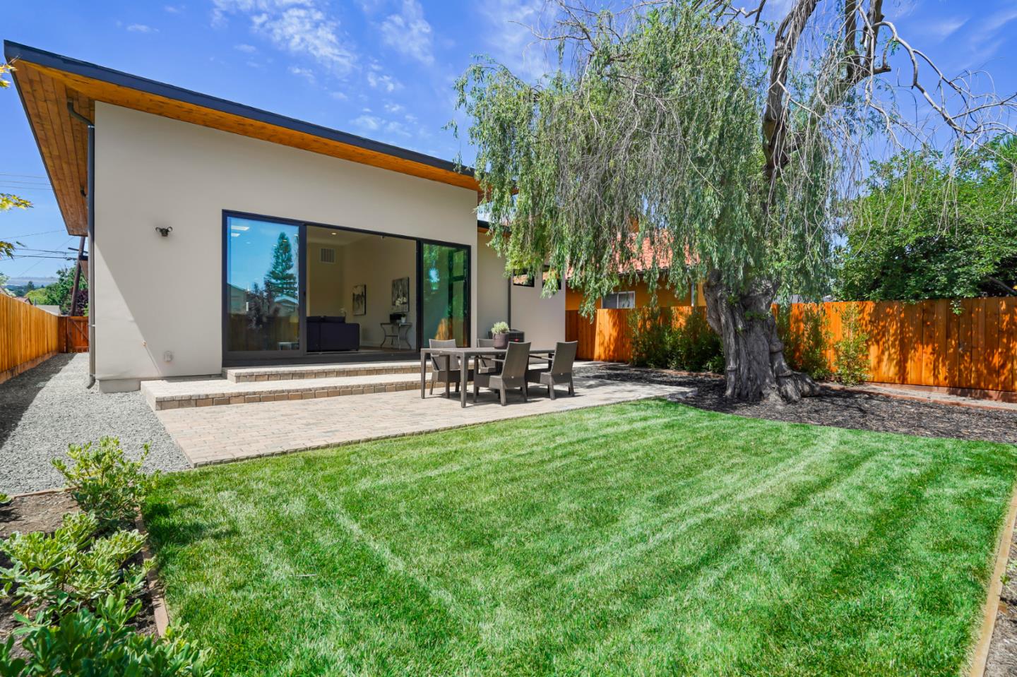 737 Ruby Street Redwood City, CA 94061 - Photo 25 of 26 a view of a chair and table in backyard
