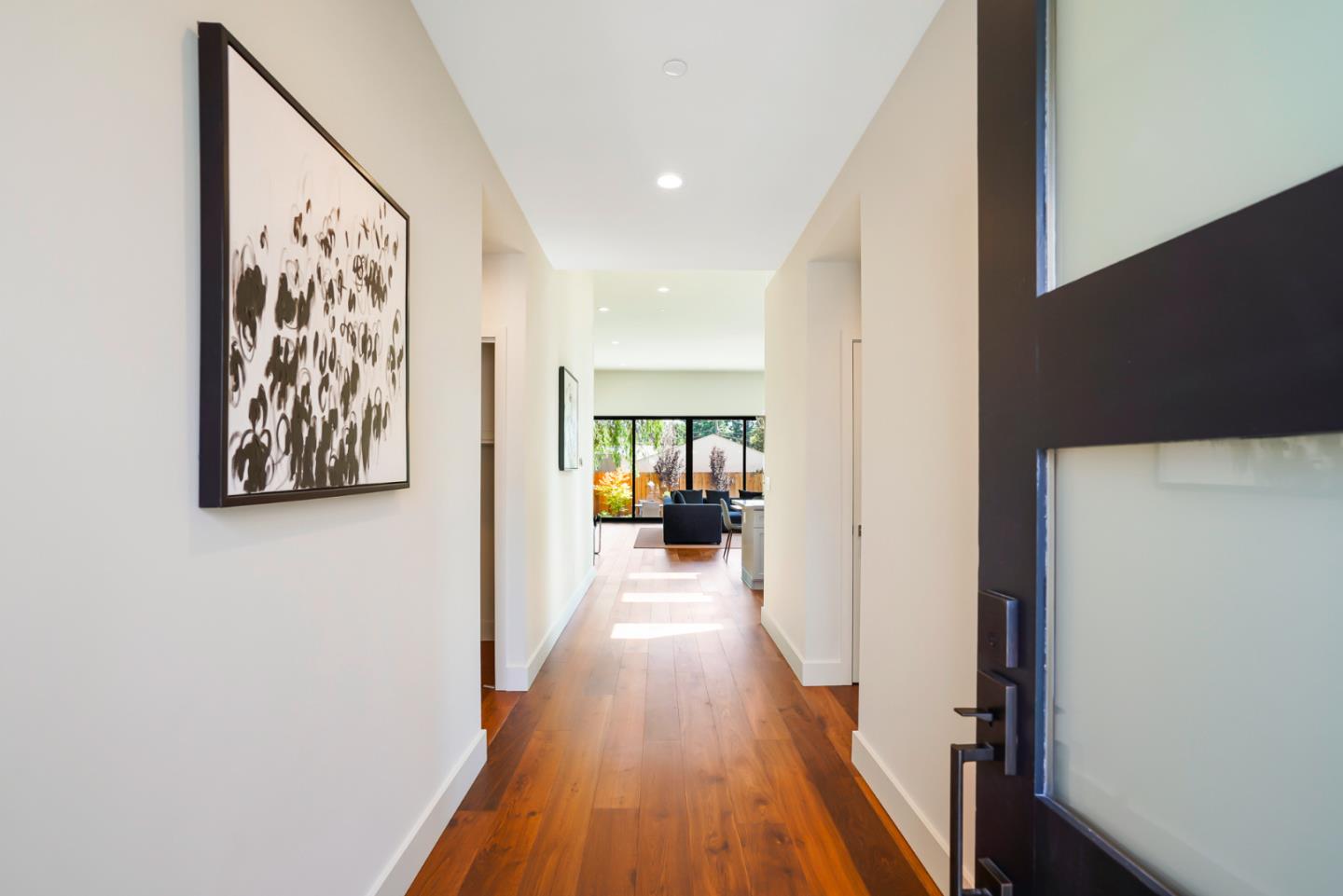 737 Ruby Street Redwood City, CA 94061 - Photo 3 of 26 a view of a hallway view with wooden floor and staircase