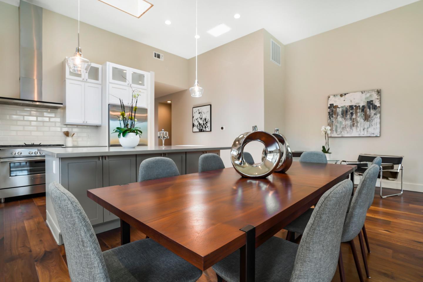 737 Ruby Street Redwood City, CA 94061 - Photo 6 of 26 a view of a dining room with furniture and wooden floor