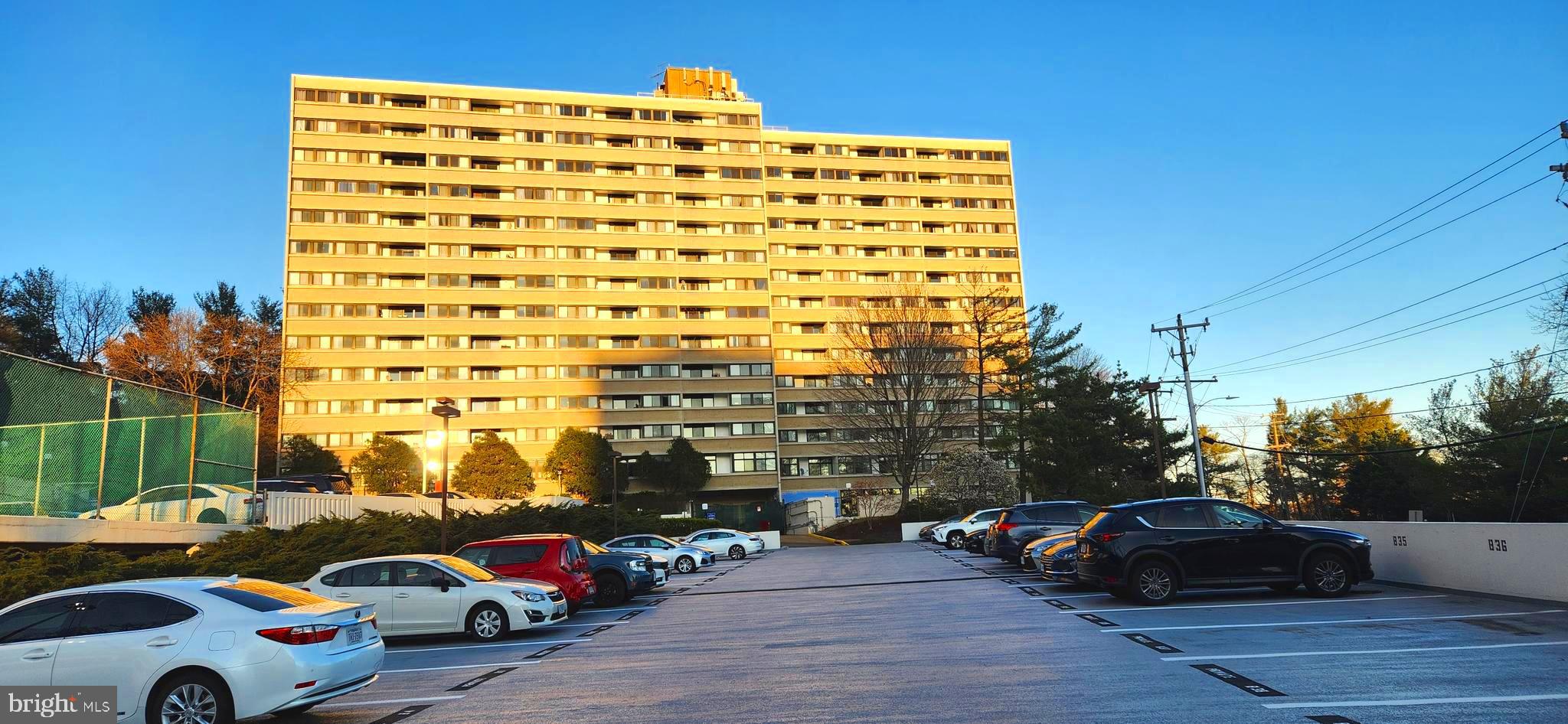 5911 Edsall Road, Unit 207 Alexandria, VA 22304 - Photo 1 of 22 a cars parked in front of a building