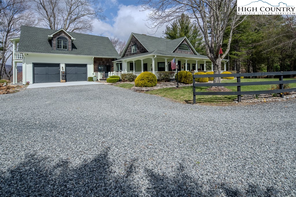 909 Daisy Ridge Road Banner Elk, NC 28604 - Photo 45 of 47 front view of a house with a yard