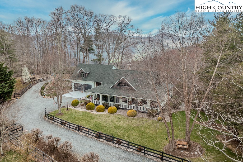 909 Daisy Ridge Road Banner Elk, NC 28604 - Photo 46 of 47 a view of a house with a yard