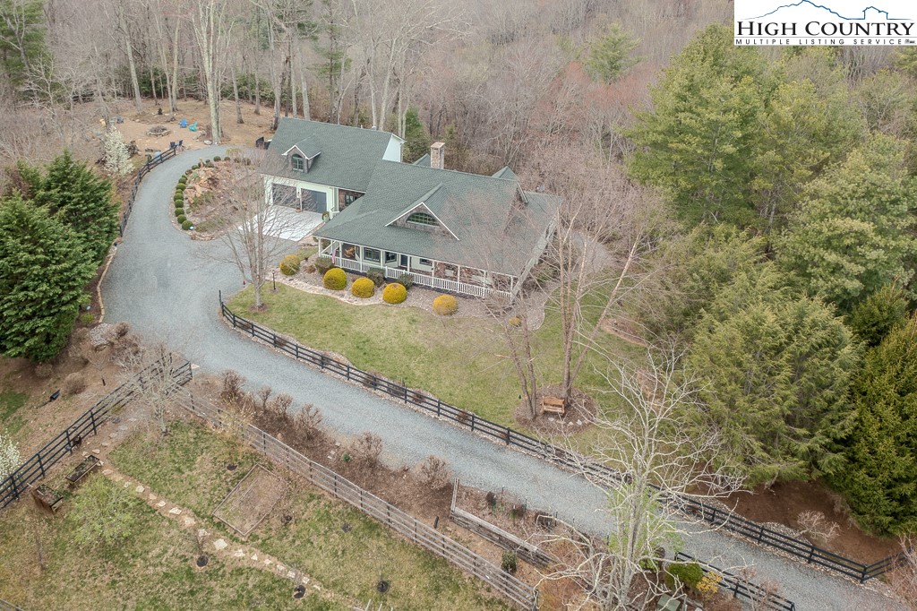 909 Daisy Ridge Road Banner Elk, NC 28604 - Photo 47 of 47 an aerial view of a house with a yard and lake view