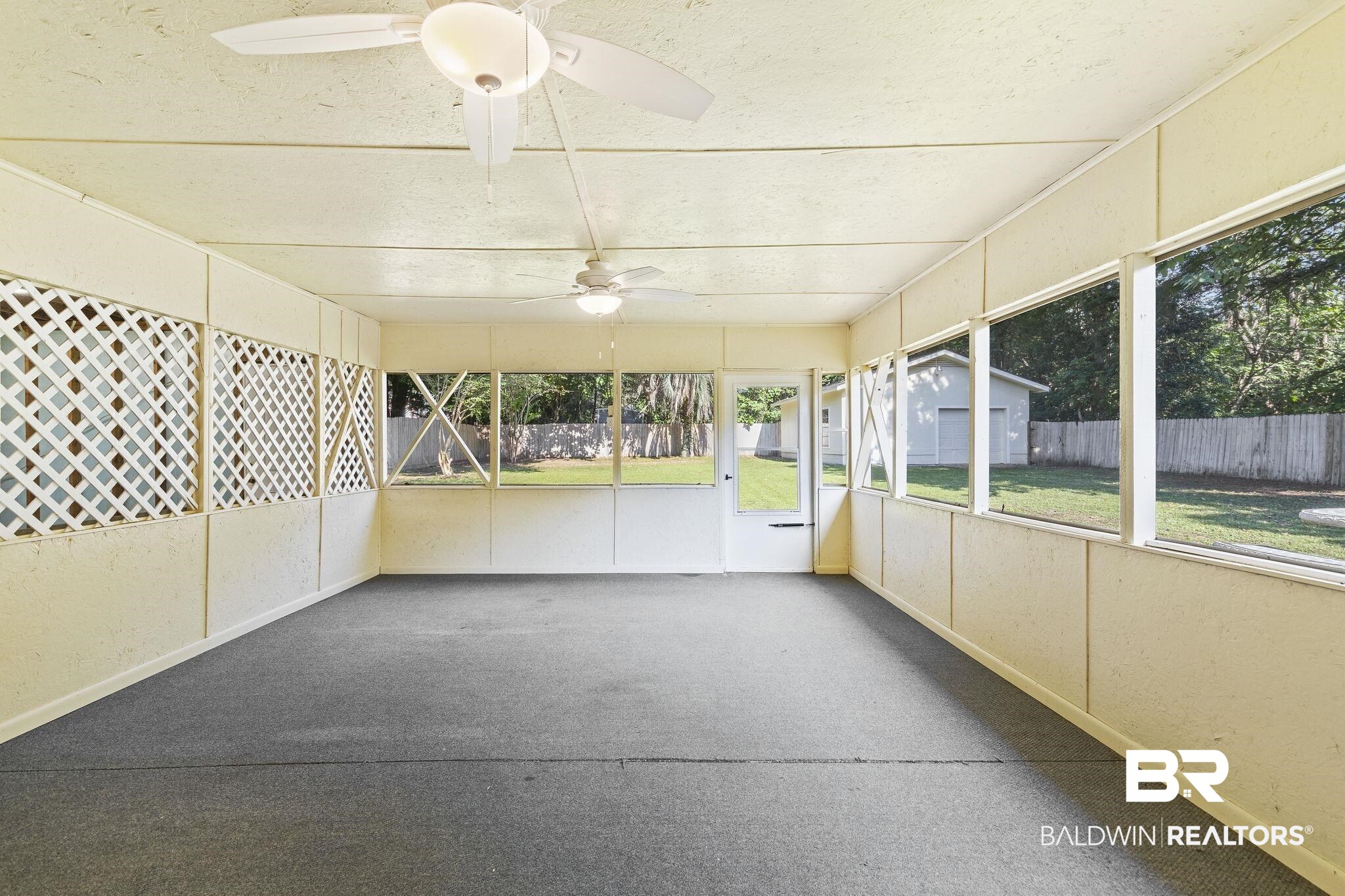 4366 Barden Avenue Mobile, AL 36619 - Photo 37 of 40 Unfurnished sunroom featuring ceiling fan and a wealth of natural light