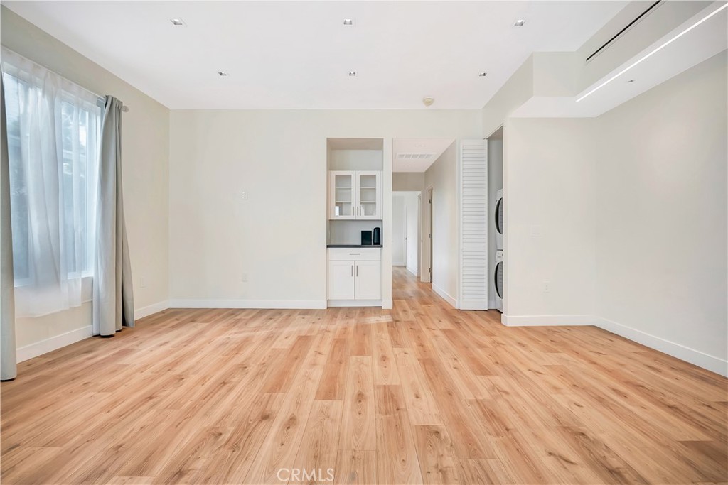 6721 Rhea Reseda, CA 91335 - Photo 12 of 22 a view of empty room with wooden floor and entryway