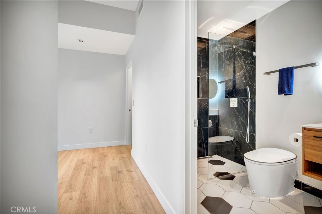 6721 Rhea Reseda, CA 91335 - Photo 17 of 22 a bathroom with a toilet and a shower