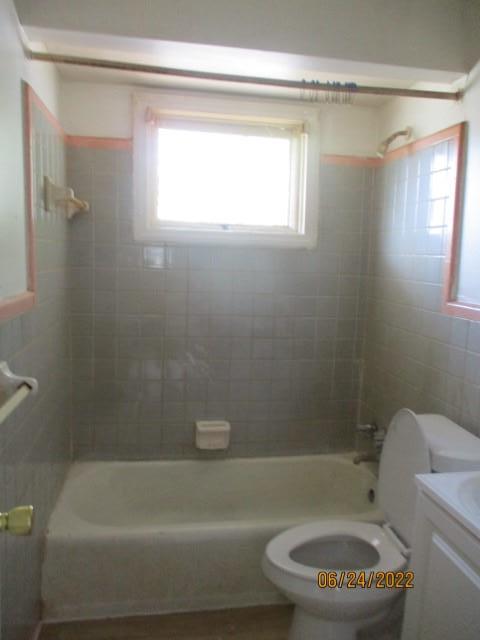 2334 Fort Benning Road, Unit 3 Columbus, GA 31903 - Photo 11 of 13 a bathroom with a toilet and a bath tub