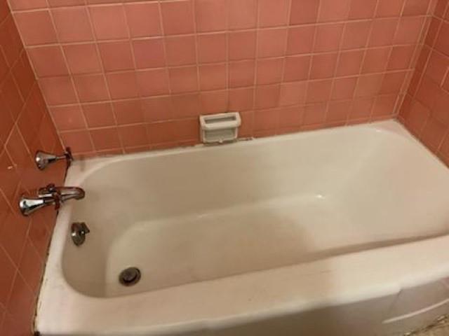 2334 Fort Benning Road, Unit 3 Columbus, GA 31903 - Photo 12 of 13 a bathroom with a bathtub