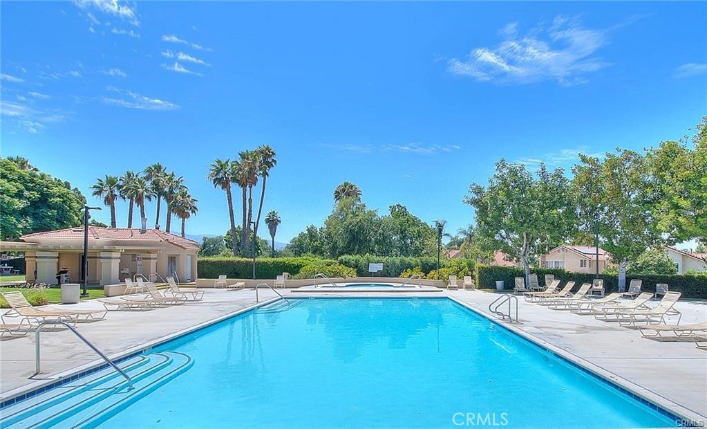 13001 August Circle Riverside, CA 92503 - Photo 36 of 37 a swimming pool with outdoor seating and yard