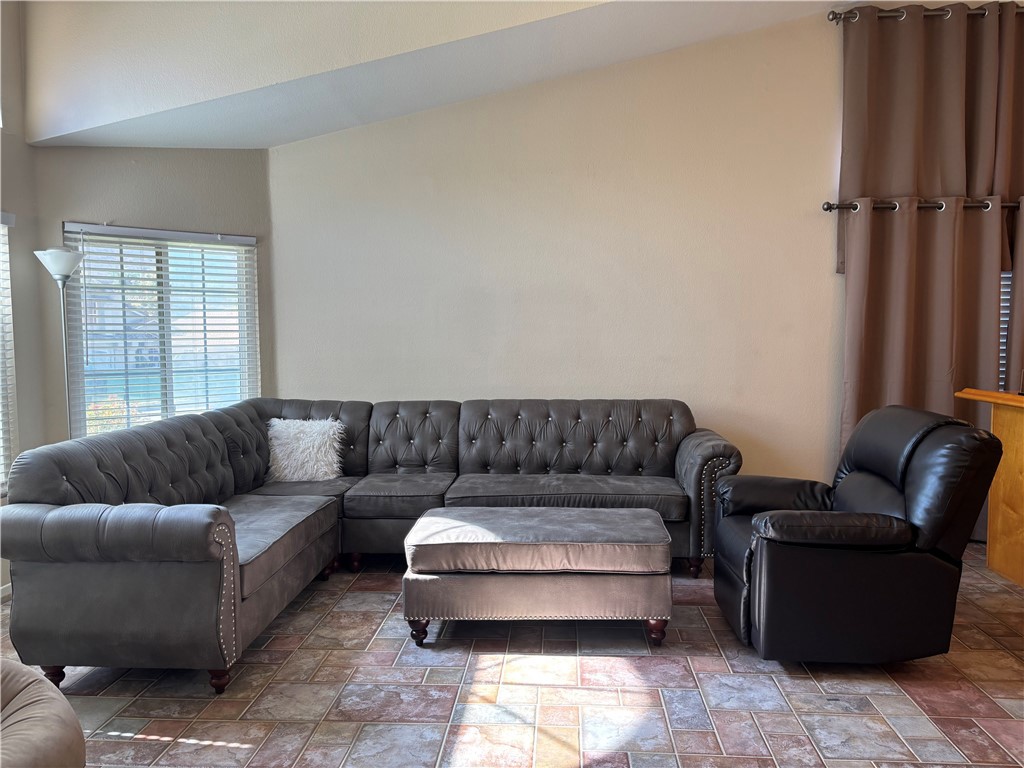 13001 August Circle Riverside, CA 92503 - Photo 6 of 37 a living room with furniture and a window