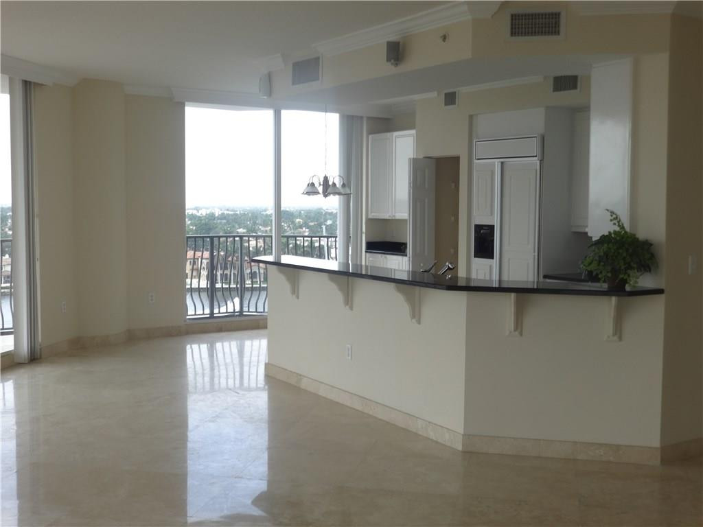 100 South Birch Road, Unit 1106B Fort Lauderdale, FL 33316 - Photo 17 of 34 a view of a balcony a window and wooden floor