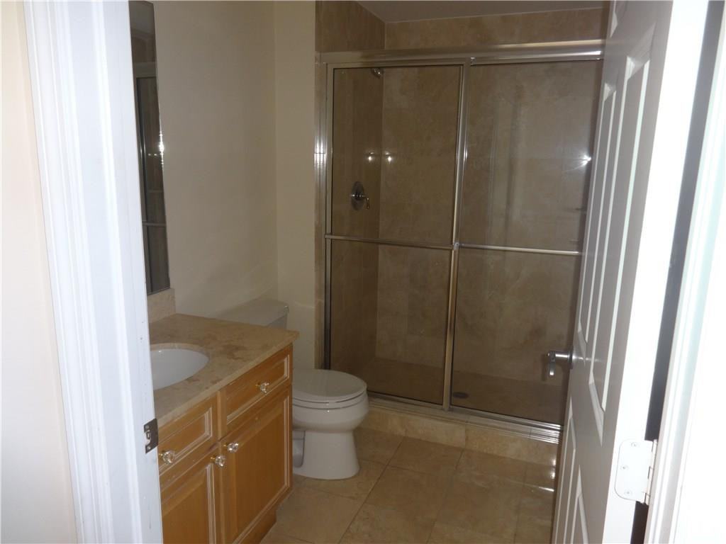 100 South Birch Road, Unit 1106B Fort Lauderdale, FL 33316 - Photo 21 of 34 a bathroom with a shower and a sink
