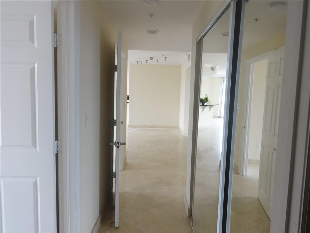 100 South Birch Road, Unit 1106B Fort Lauderdale, FL 33316 - Photo 24 of 34 a bathroom with a glass shower door