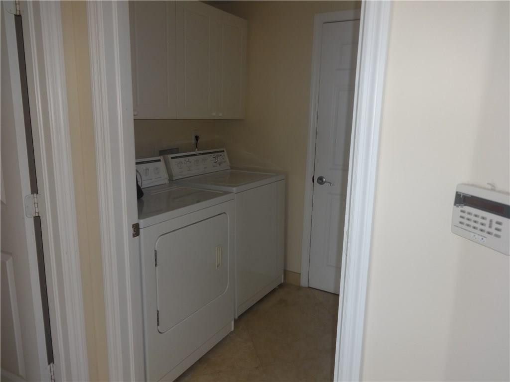 100 South Birch Road, Unit 1106B Fort Lauderdale, FL 33316 - Photo 28 of 34 a utility room with washing machine